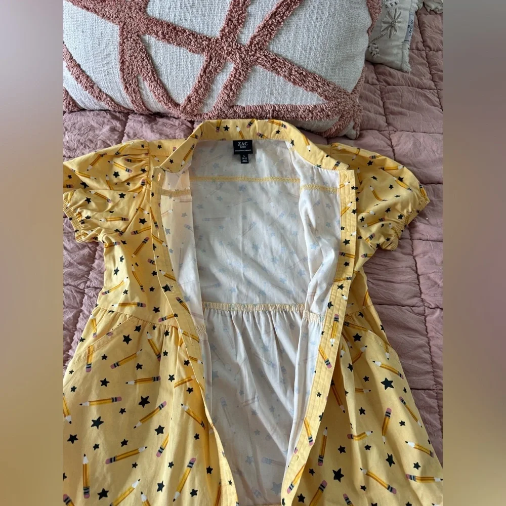 Girls size large (10/12)  school dress with pencils